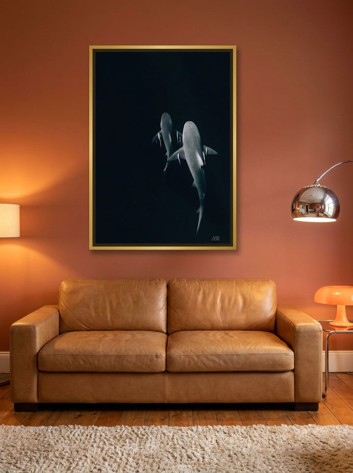 Oversized statement canvas wall art with a gold leaf surround styled on the wall in a retro 70s living room