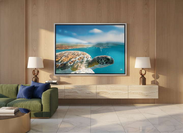 Oversized statement canvas wall art with a silver leaf surround styled on the wall in a luxe living room