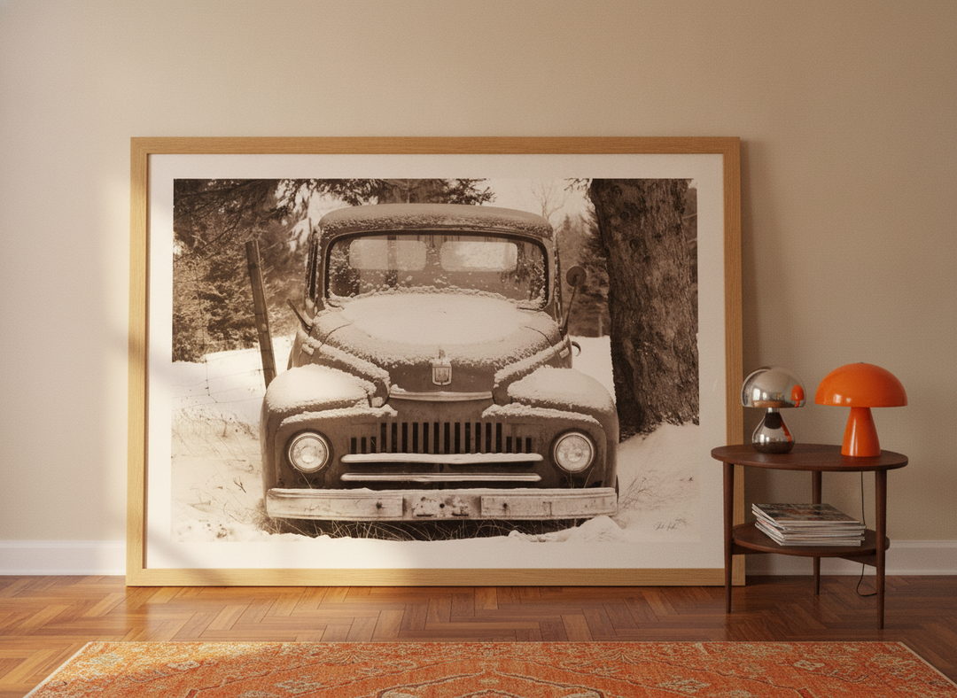 Oversized statement modern wall art print leaning against the wall in a retro 70s dining room
