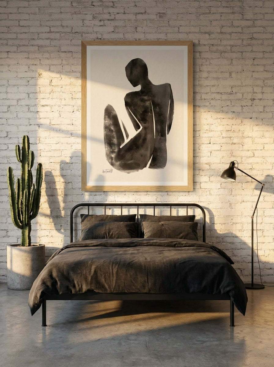Modern wall art print styled on the wall in an industrial loft bedroom