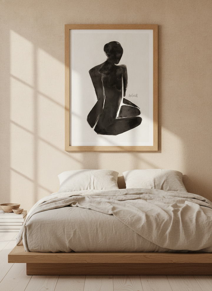 Modern wall art print styled on the wall in a warm Japandi bedroom