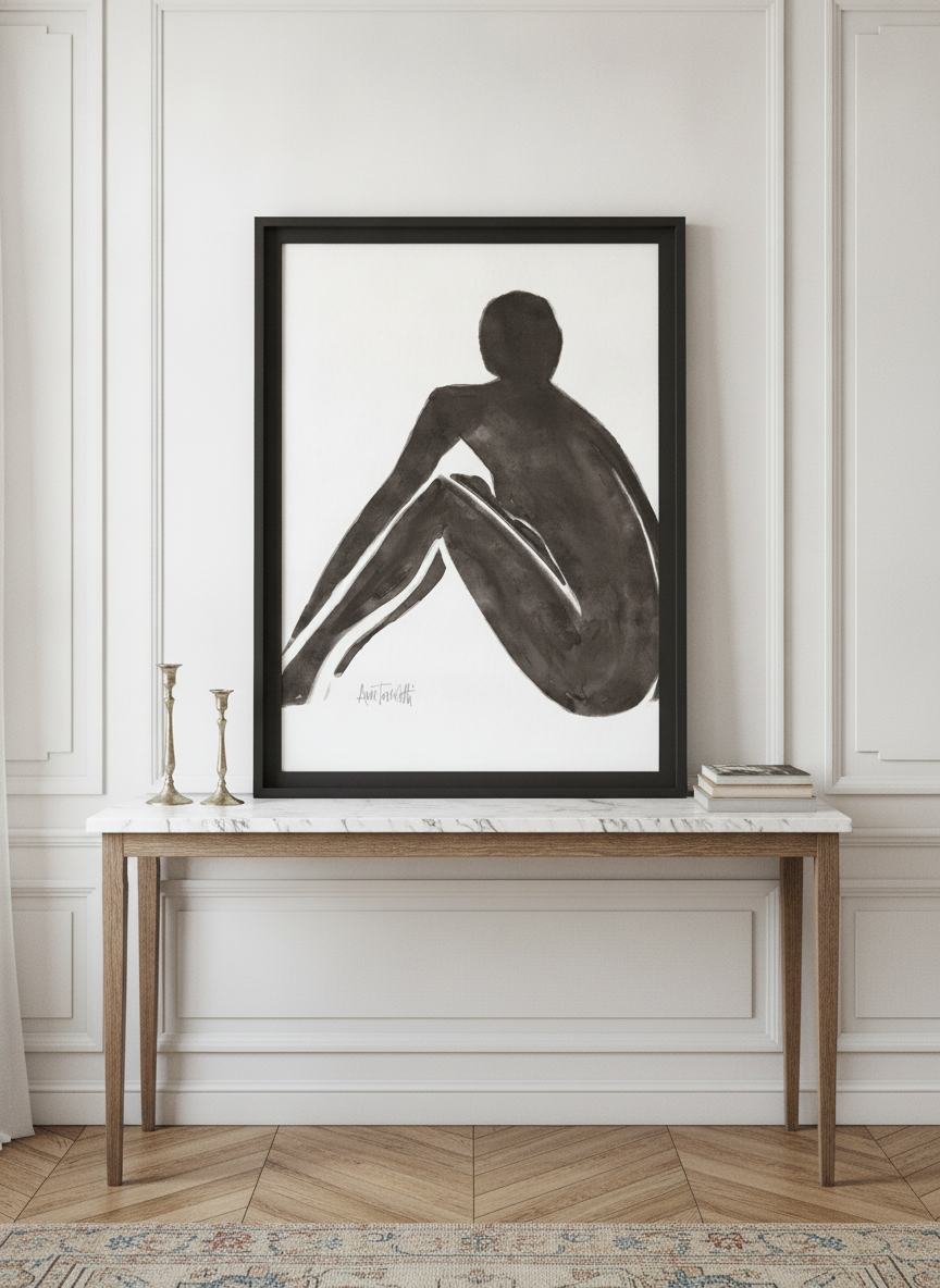 Modern wall art print standing on a console in a Parisian bathroom