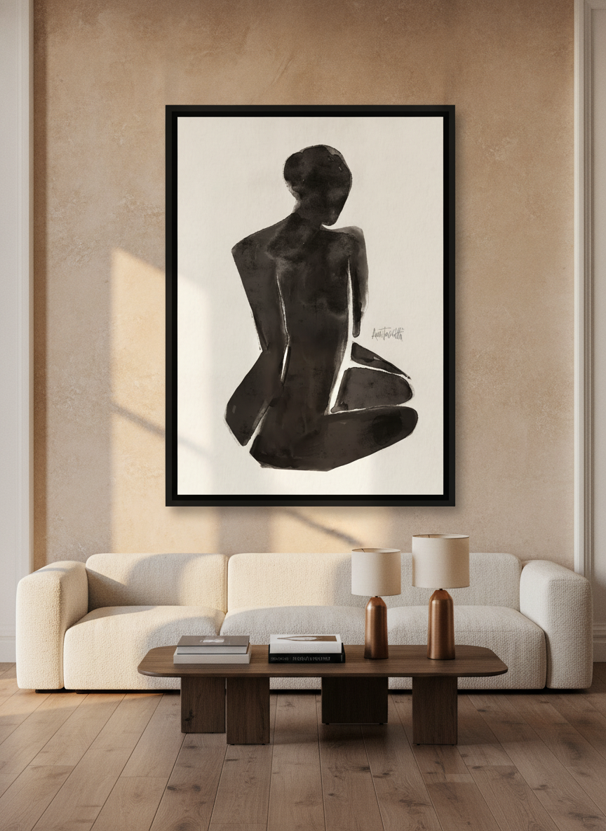 Oversized statement canvas wall art with a black surround styled on the wall in a luxe living room