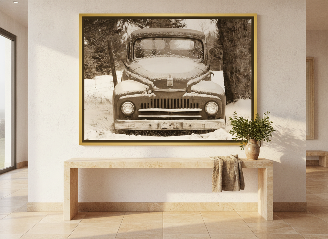 Oversized statement canvas wall art with a gold leaf surround styled on the wall in a Mediterranean living room
