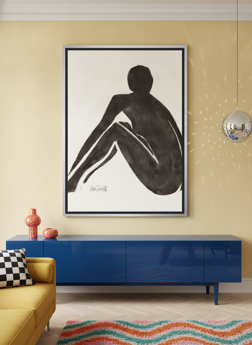 Oversized statement canvas wall art with a silver leaf surround styled on the wall in a colourful eclectic living room
