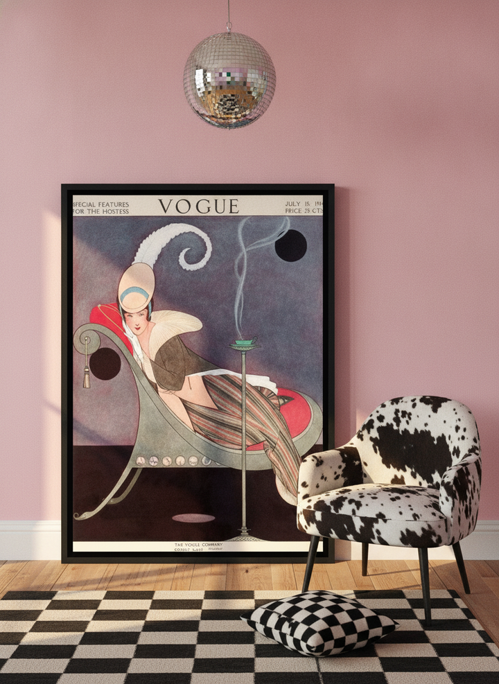 Canvas wall art with a black surround leaning against the wall in a colourful eclectic bedroom