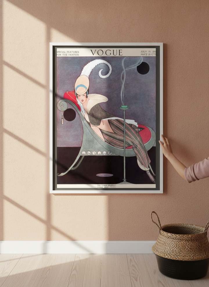 Person holding canvas wall art with a white surround in a Mediterranean living room