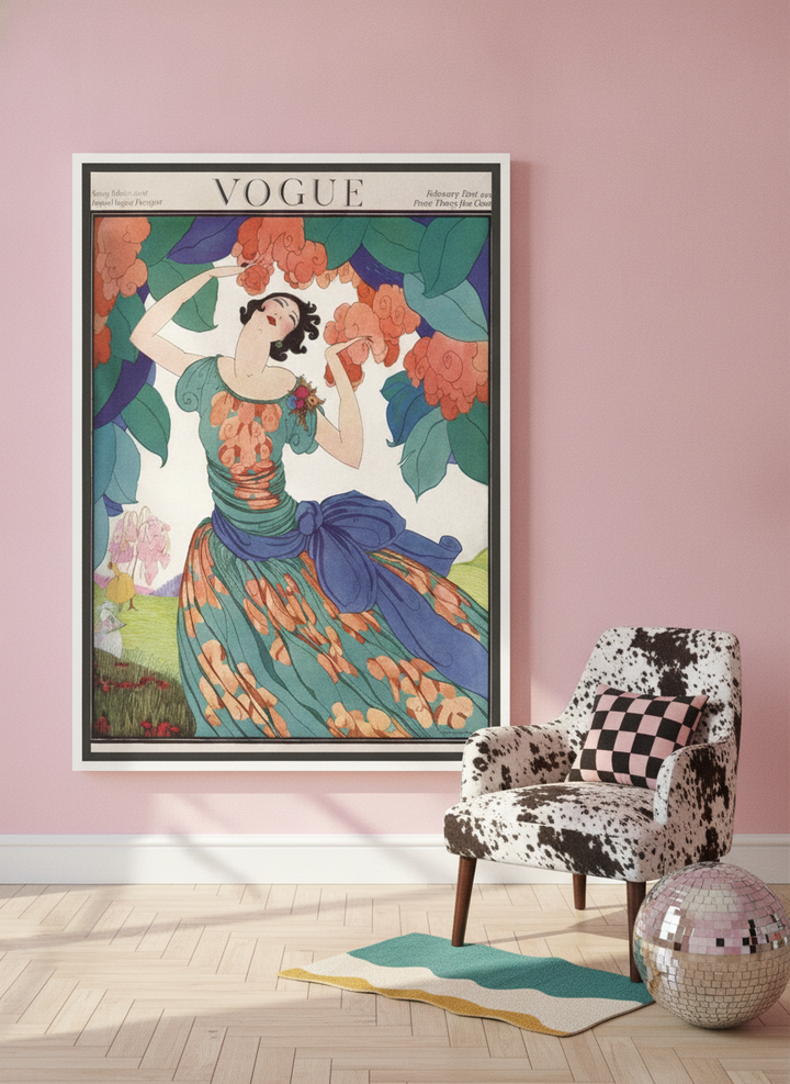 Canvas wall art with a white surround leaning against the wall in a colourful eclectic bedroom