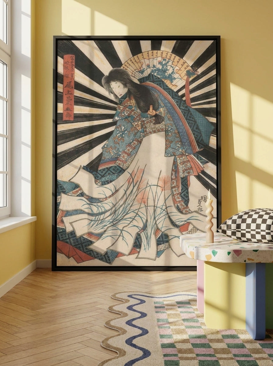 Canvas wall art with a black surround standing on a side table in a colourful eclectic bedroom