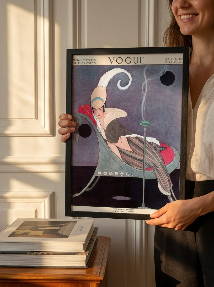 Person holding modern wall art print in a Parisian living room