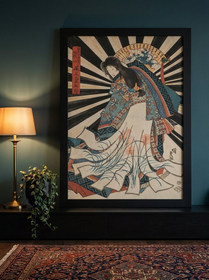 Modern wall art print standing on a console in a moody bedroom