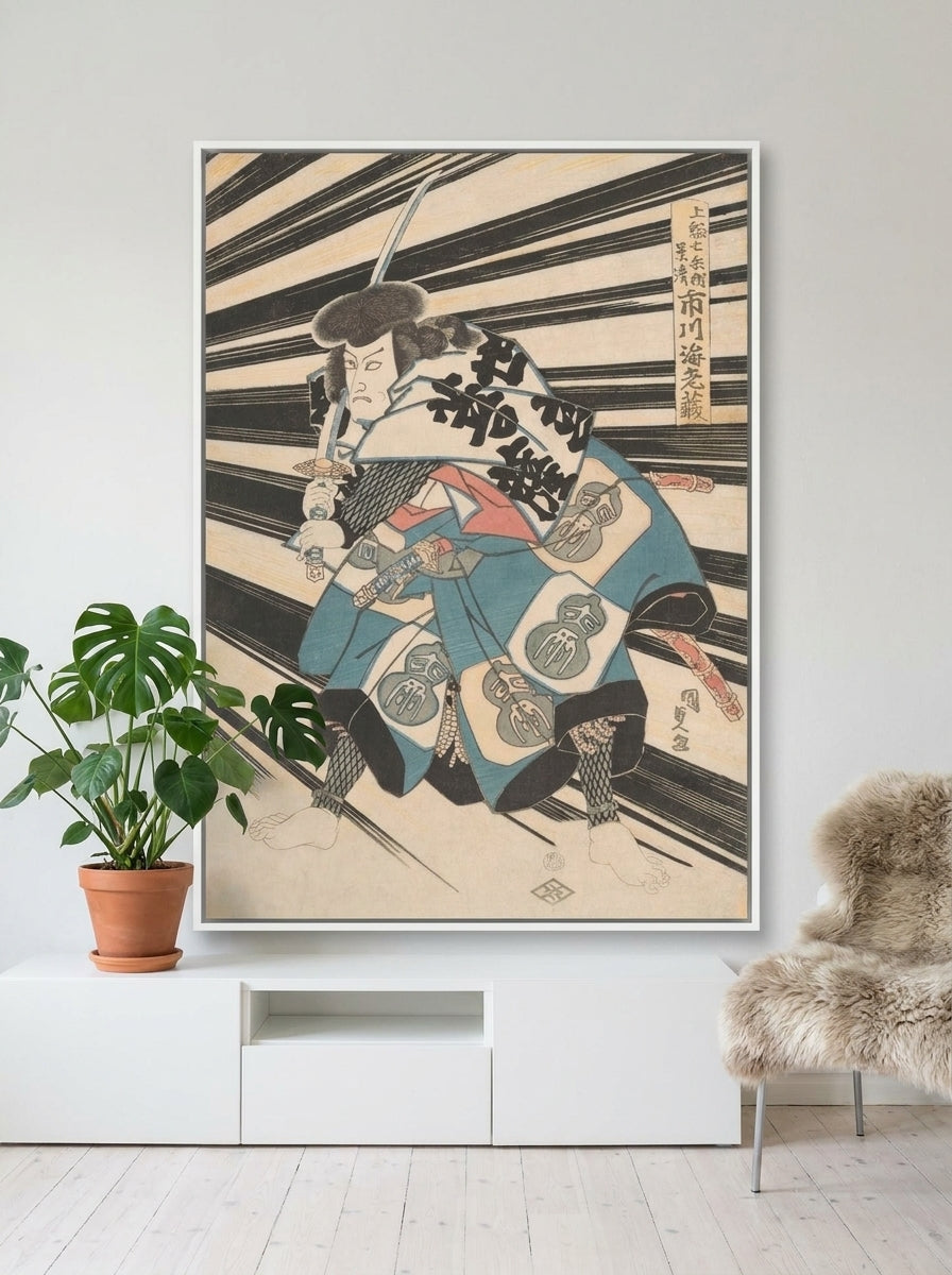 Canvas wall art with a white surround styled on the wall in a bright Scandinavian living room