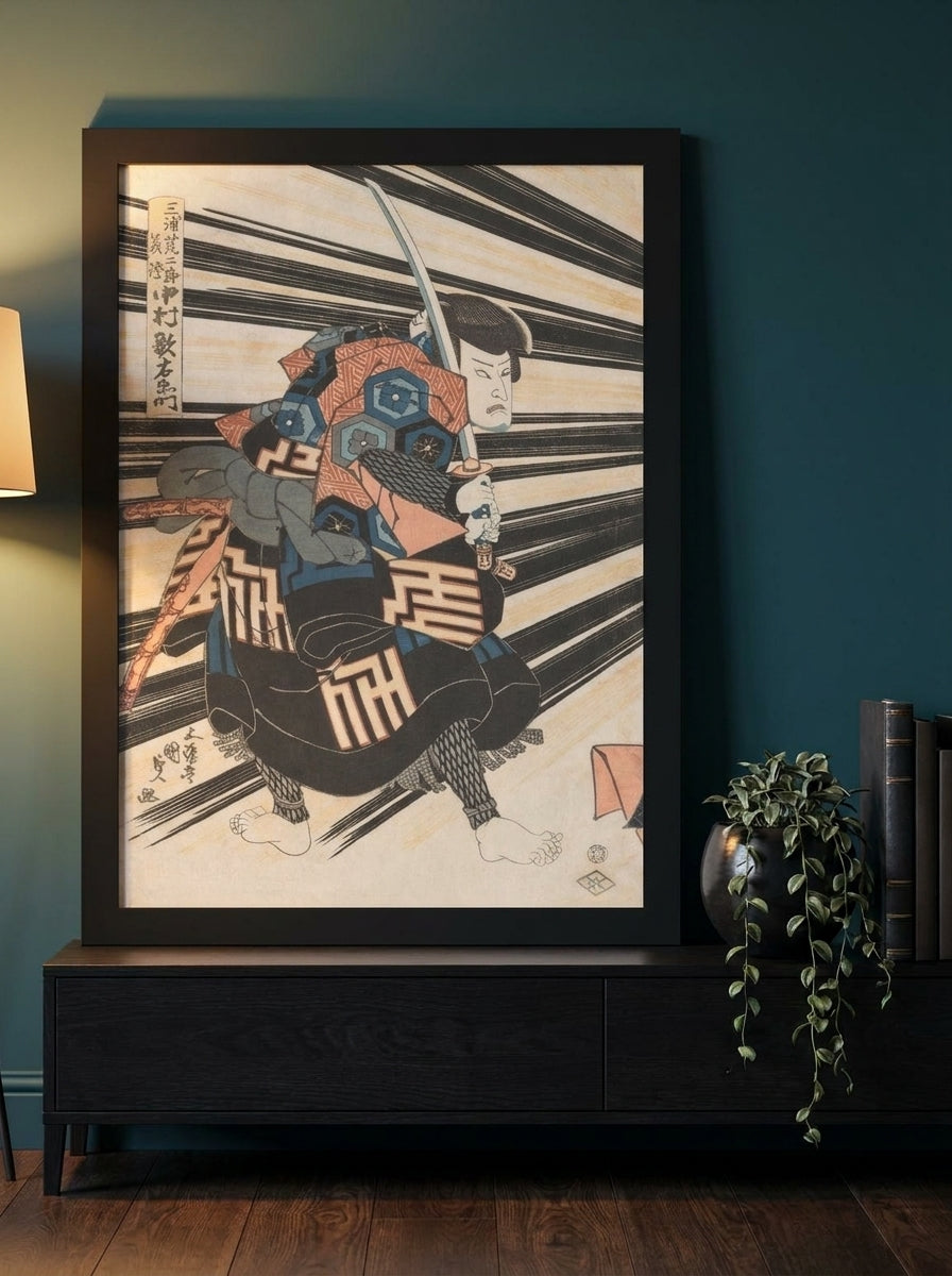 Modern wall art print standing on a console in a moody home office