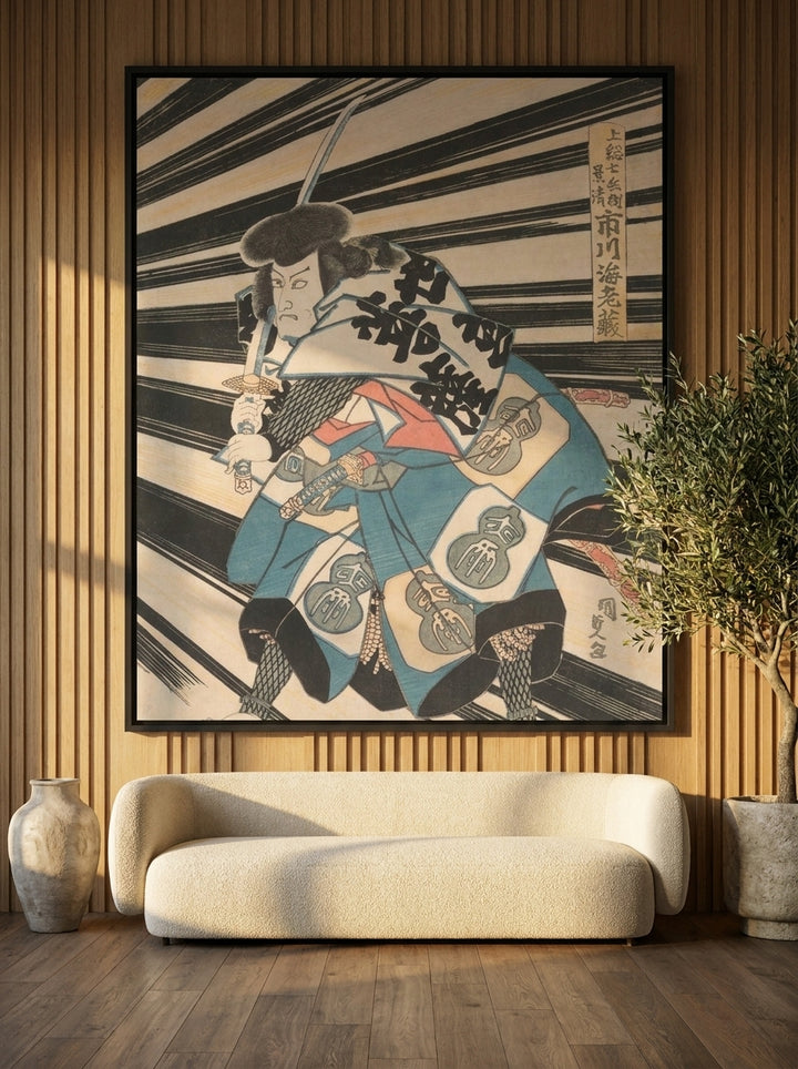 Oversized statement canvas wall art with a black surround styled on the wall in a luxe living room