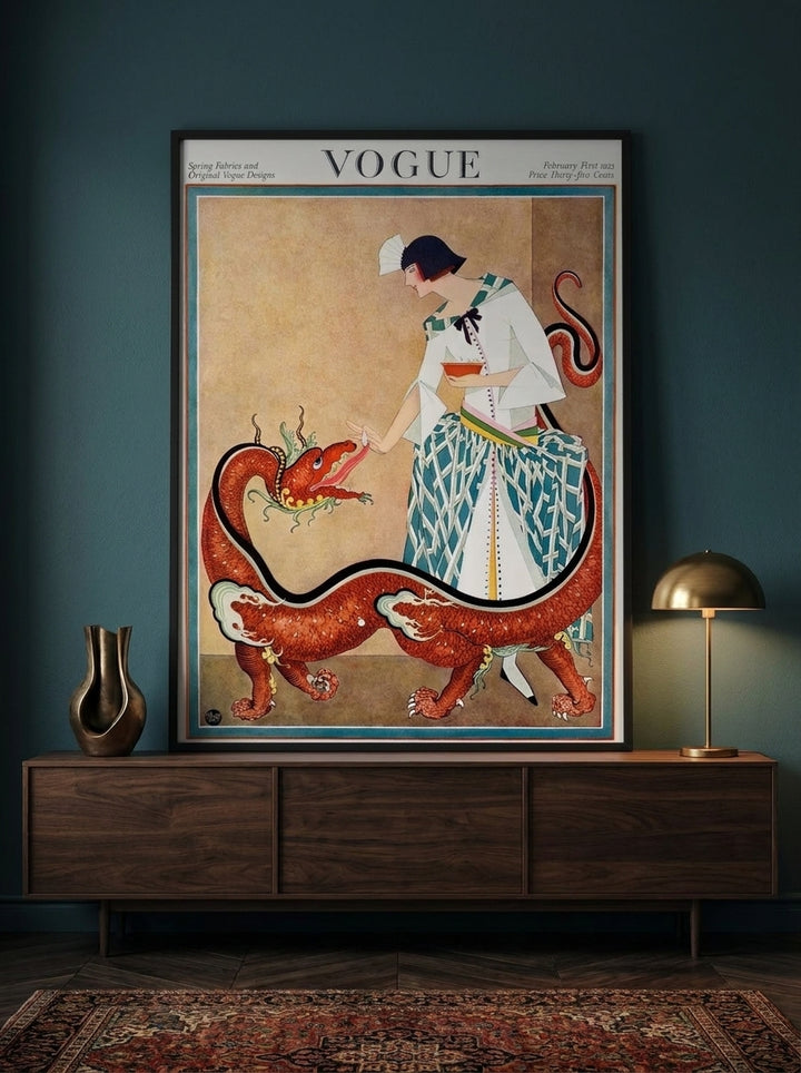 Modern wall art print standing on a sideboard in a moody living room