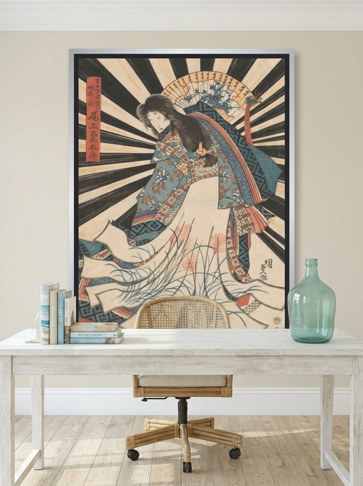 Canvas wall art with a silver leaf surround styled on the wall in a coastal home office