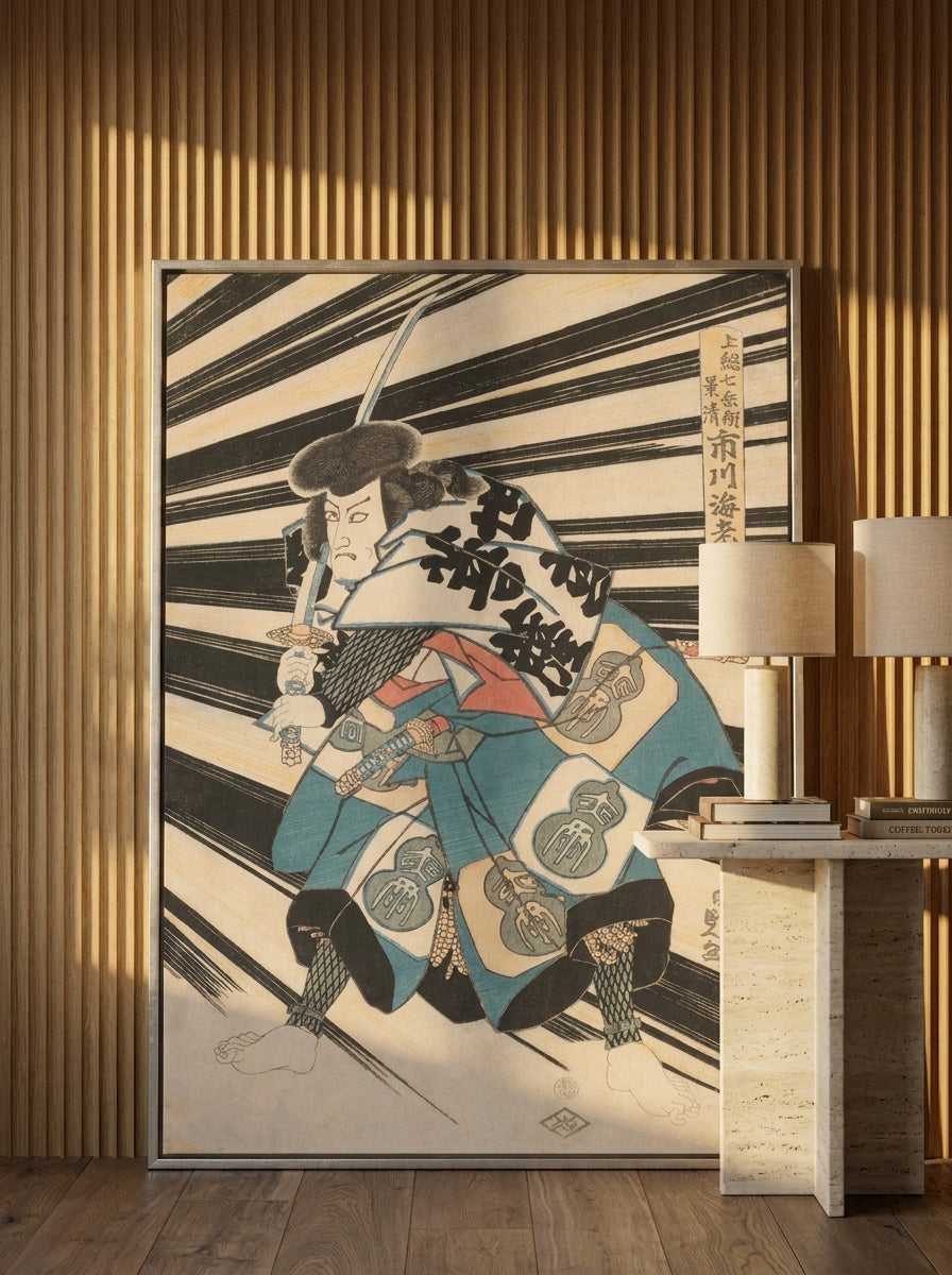 Oversized statement canvas wall art with a silver leaf surround leaning against the wall in a luxe dining room