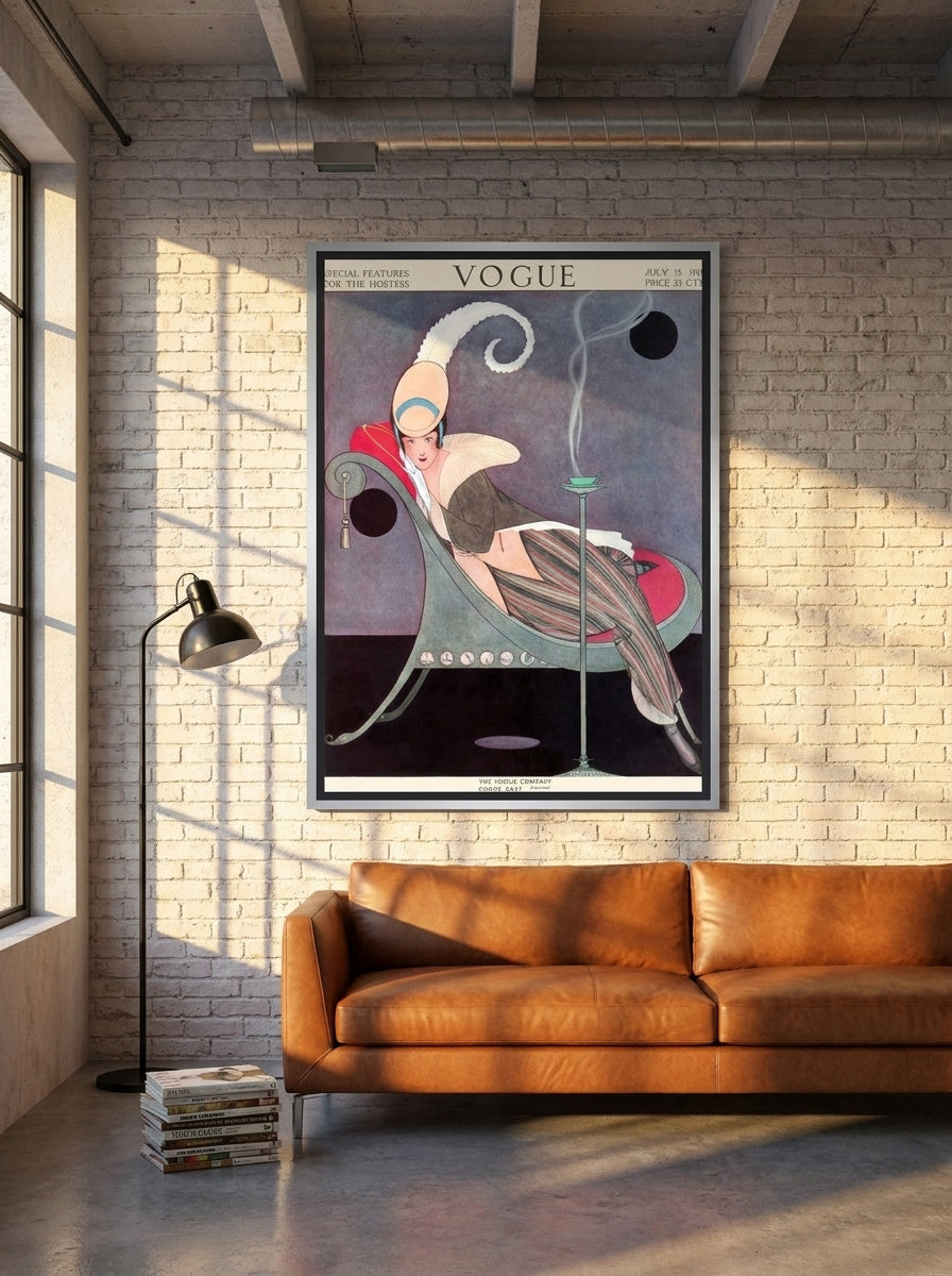 Oversized statement canvas wall art with a silver leaf surround styled on the wall in an industrial loft living room