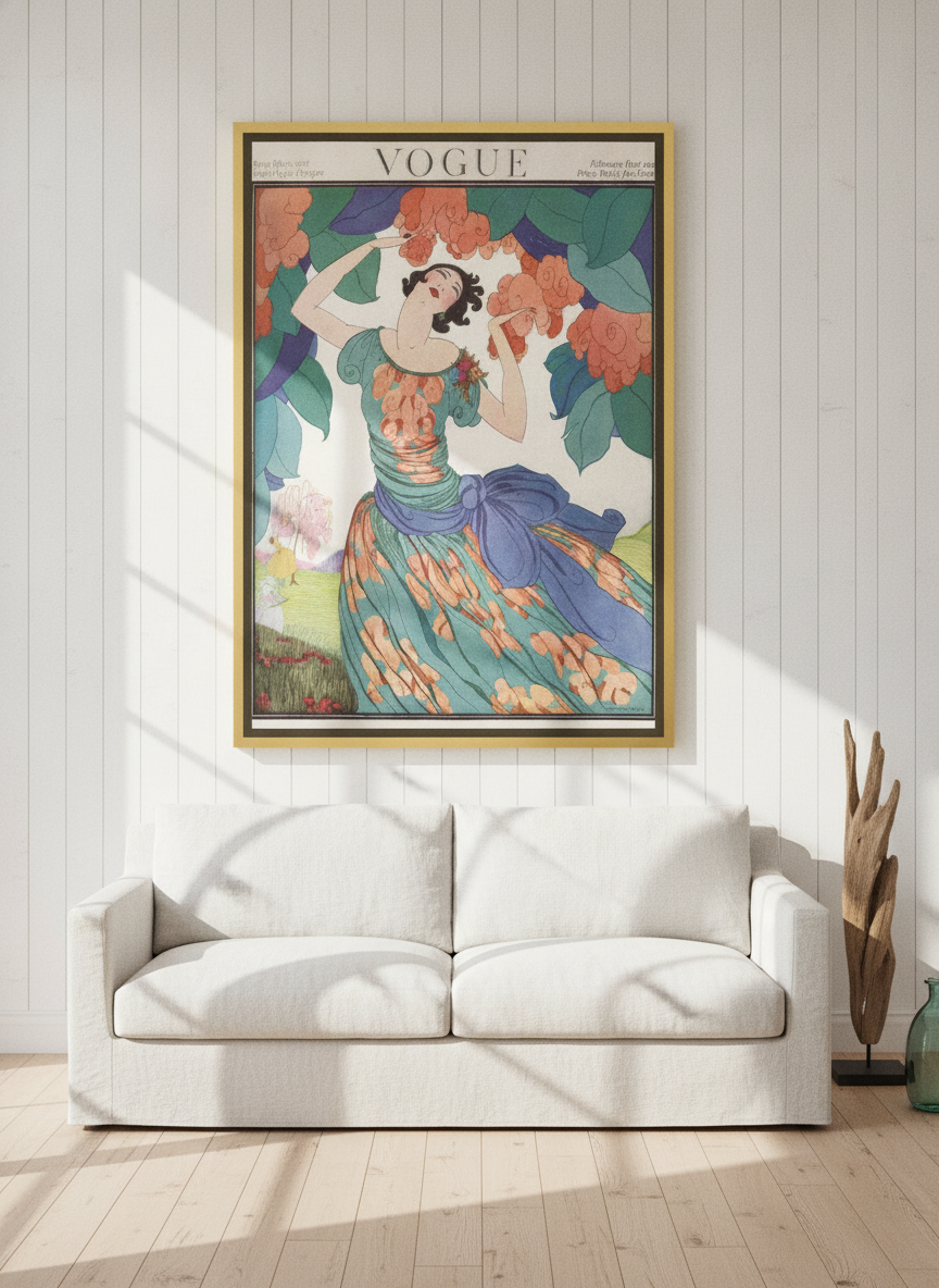Oversized statement canvas wall art with a gold leaf surround styled on the wall in a coastal living room
