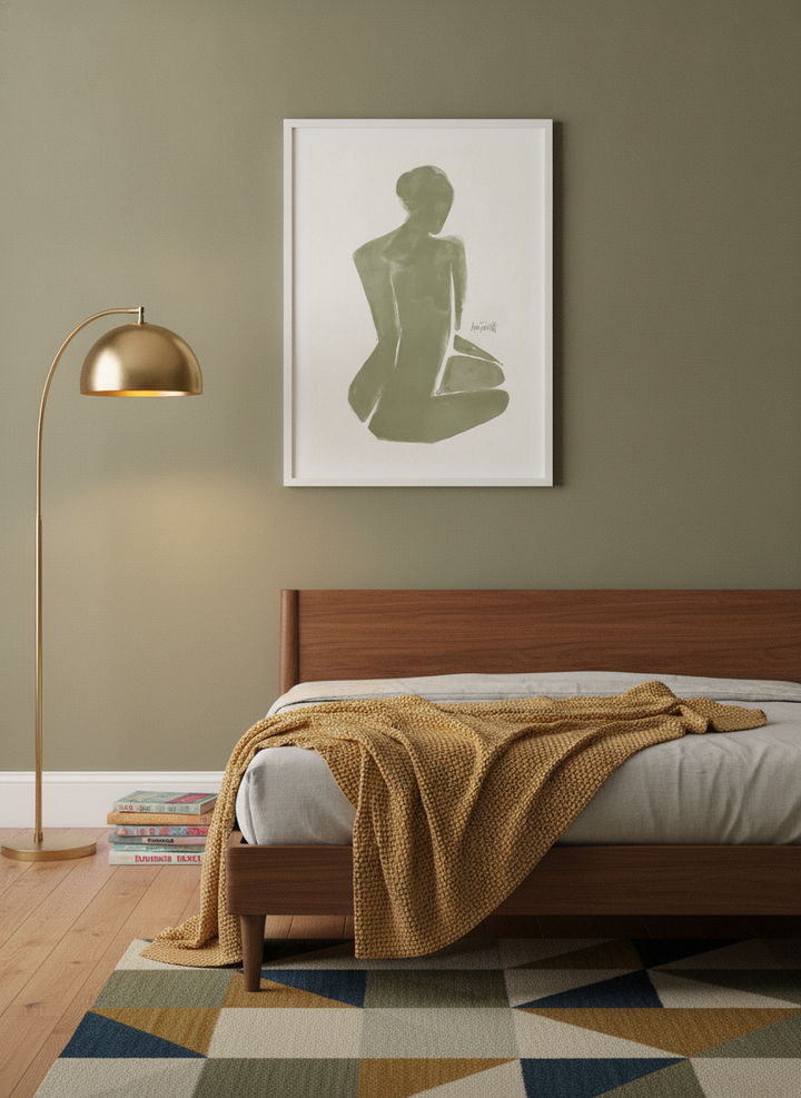 Modern wall art print styled on the wall in a mid-century bedroom