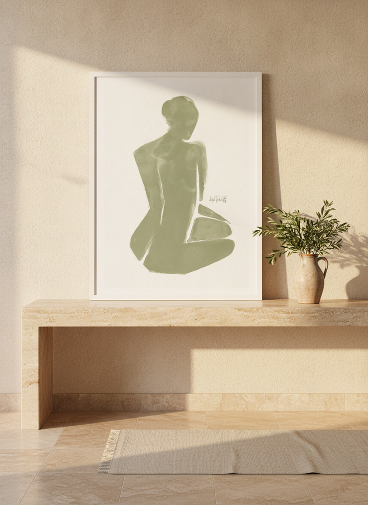 Modern wall art print standing on a console in a Mediterranean bathroom