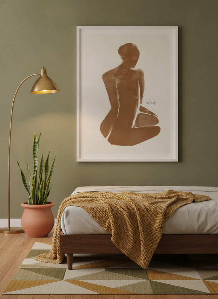 Modern wall art print styled on the wall in a mid-century bedroom