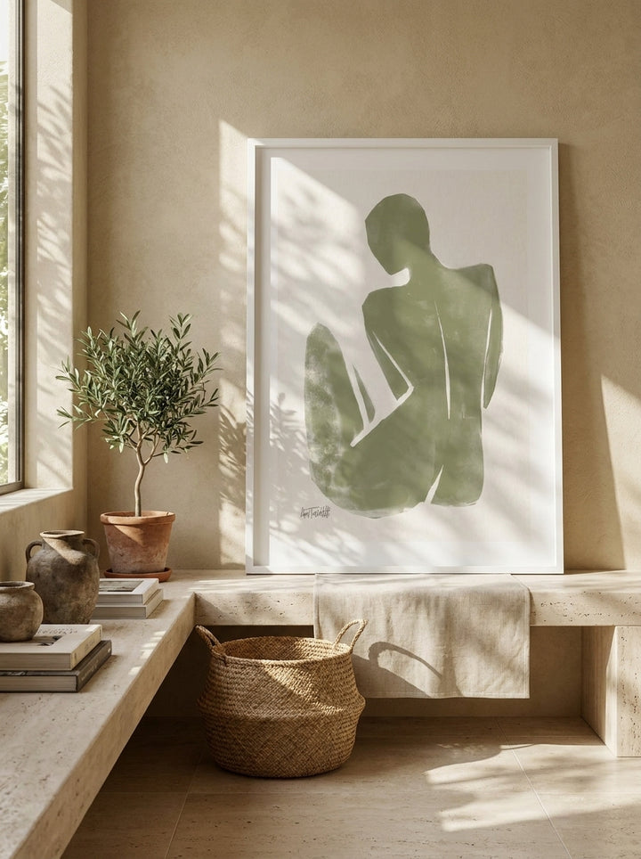 Modern wall art print standing on a console in a Mediterranean home office