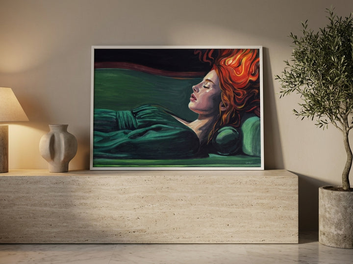 Modern wall art print standing on a console in a luxe living room
