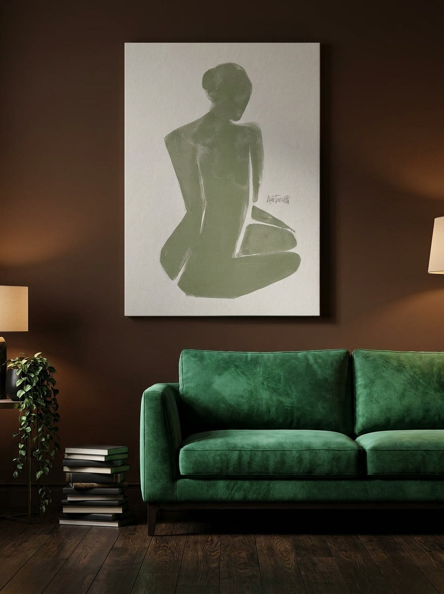 Stretched canvas wall art styled on the wall in a moody living room