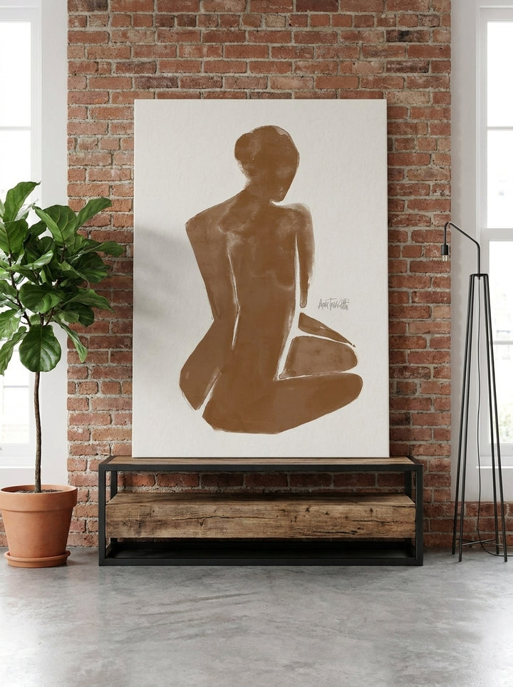 Stretched canvas wall art standing on a console in an industrial loft living room