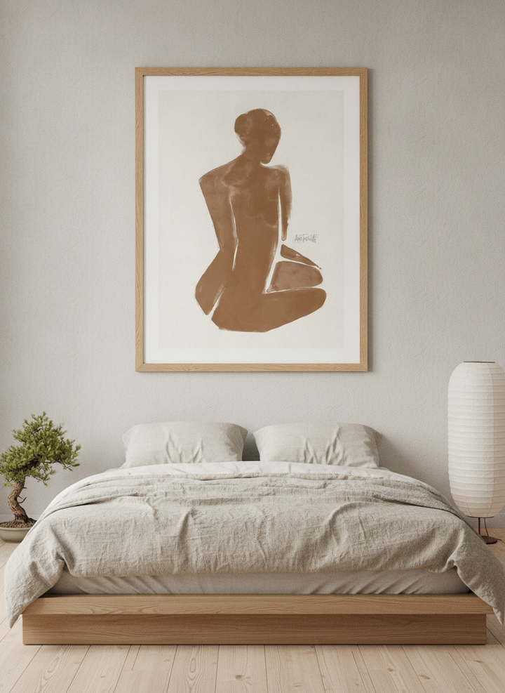 Modern wall art print styled on the wall in a warm Japandi bedroom