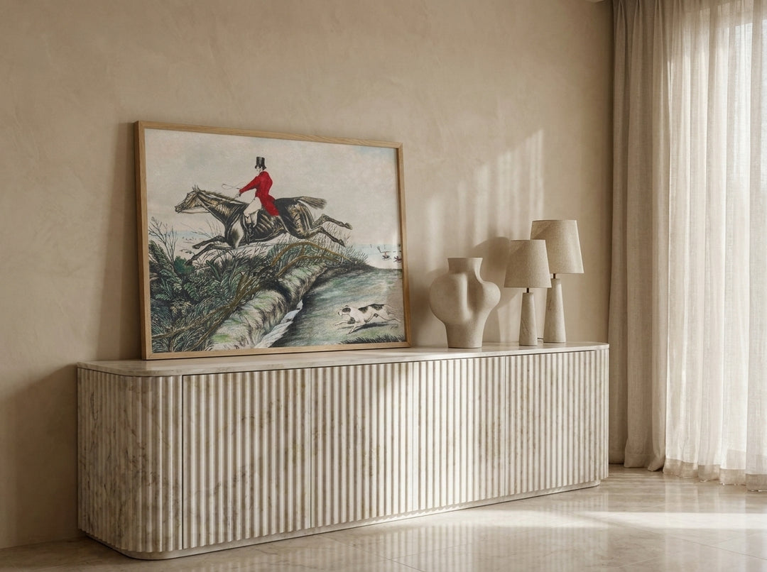 Modern wall art print standing on a sideboard in a luxe dining room