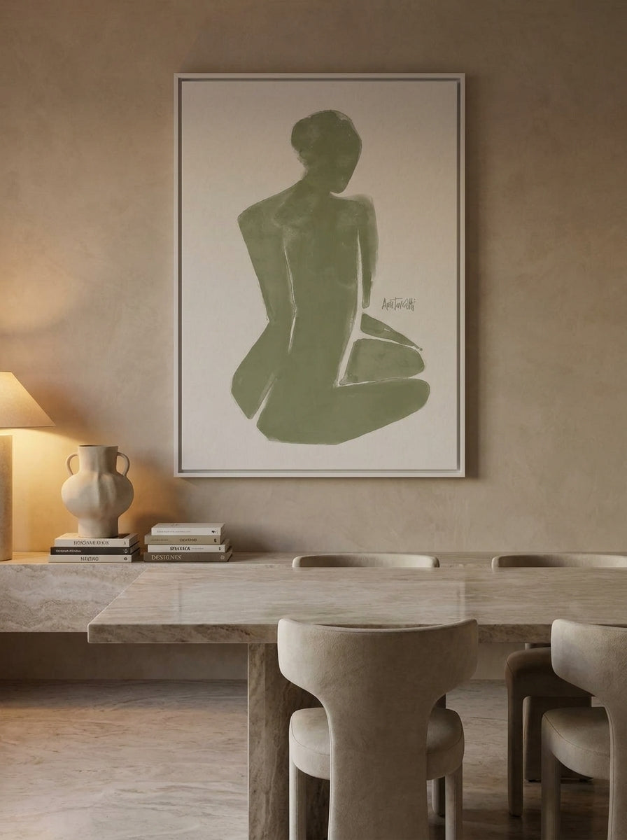 Oversized statement canvas wall art with a white surround styled on the wall in a luxe dining room