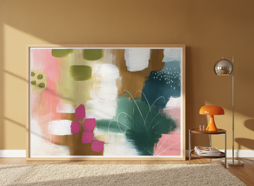 Oversized statement modern wall art print leaning against the wall in a retro 70s dining room