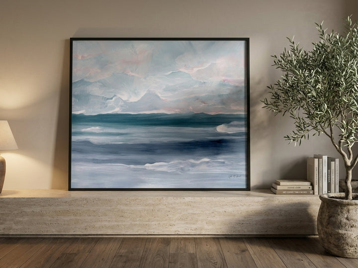 Modern wall art print standing on a console in a luxe bathroom
