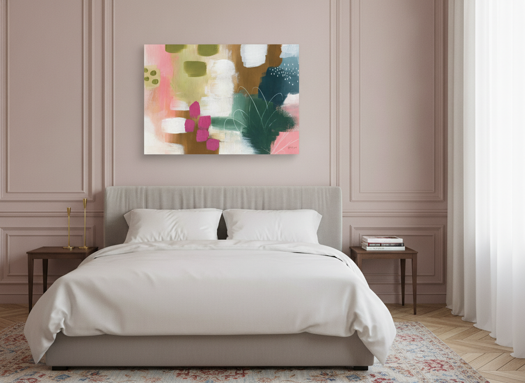 Stretched canvas wall art styled on the wall in a Parisian bedroom