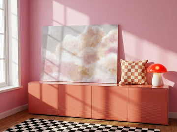 Stretched canvas wall art standing on a sideboard in a colourful eclectic nursery