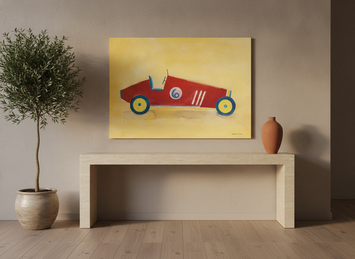 Stretched canvas wall art standing on a console in a luxe living room