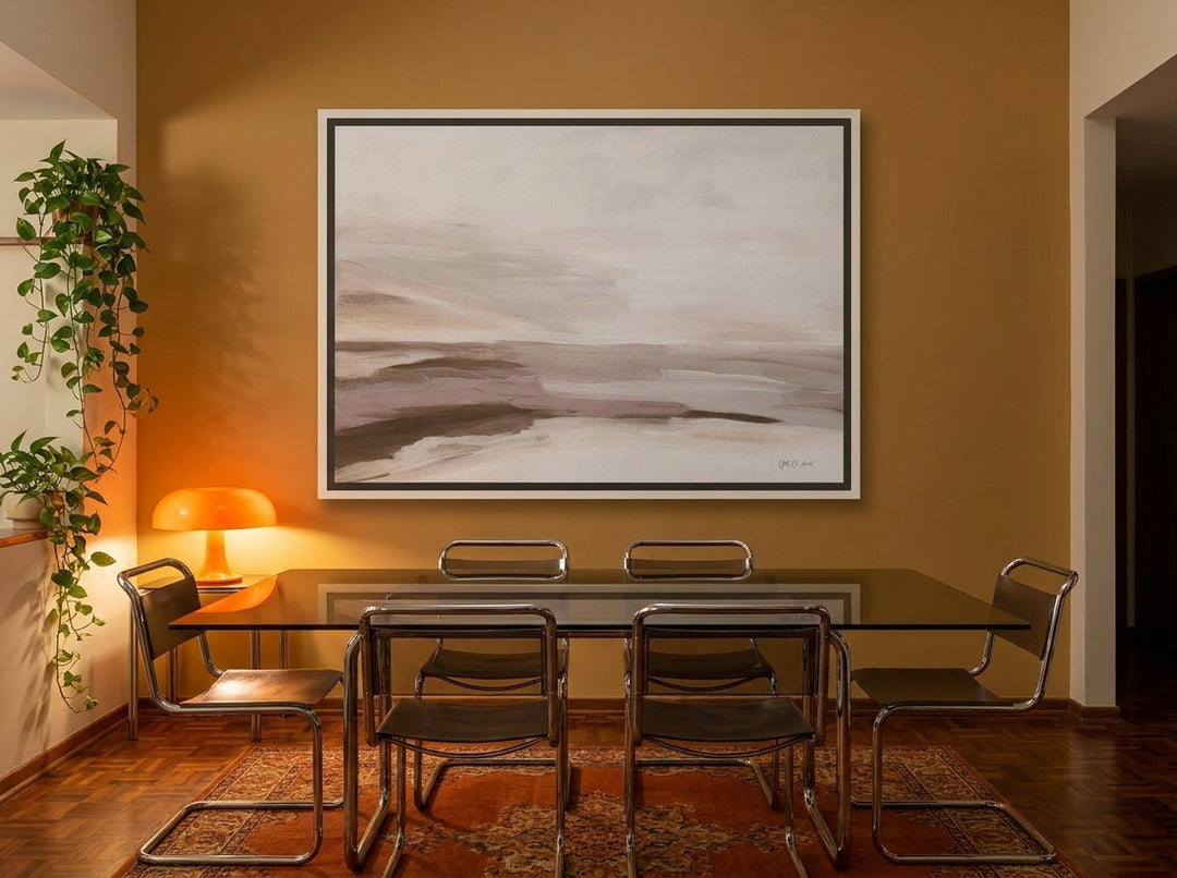 Oversized statement canvas wall art with a white surround styled on the wall in a retro 70s dining room
