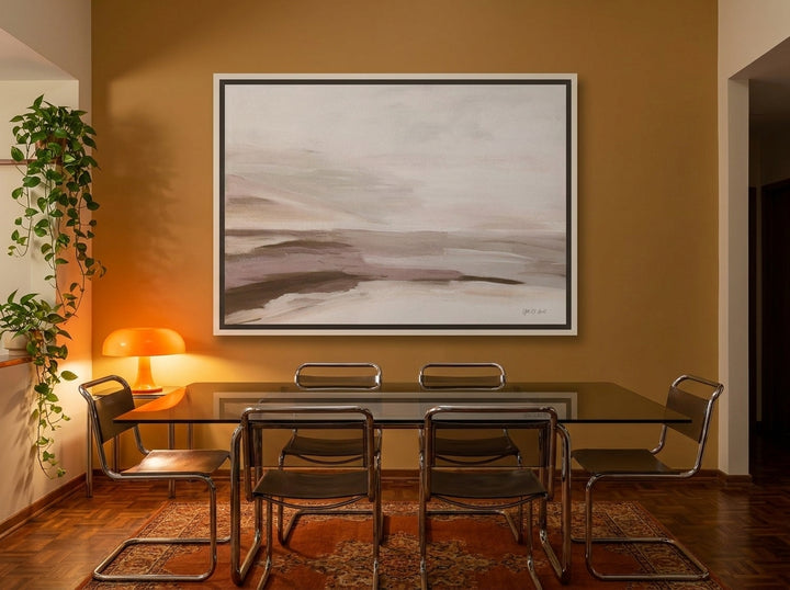 Oversized statement canvas wall art with a white surround styled on the wall in a retro 70s dining room