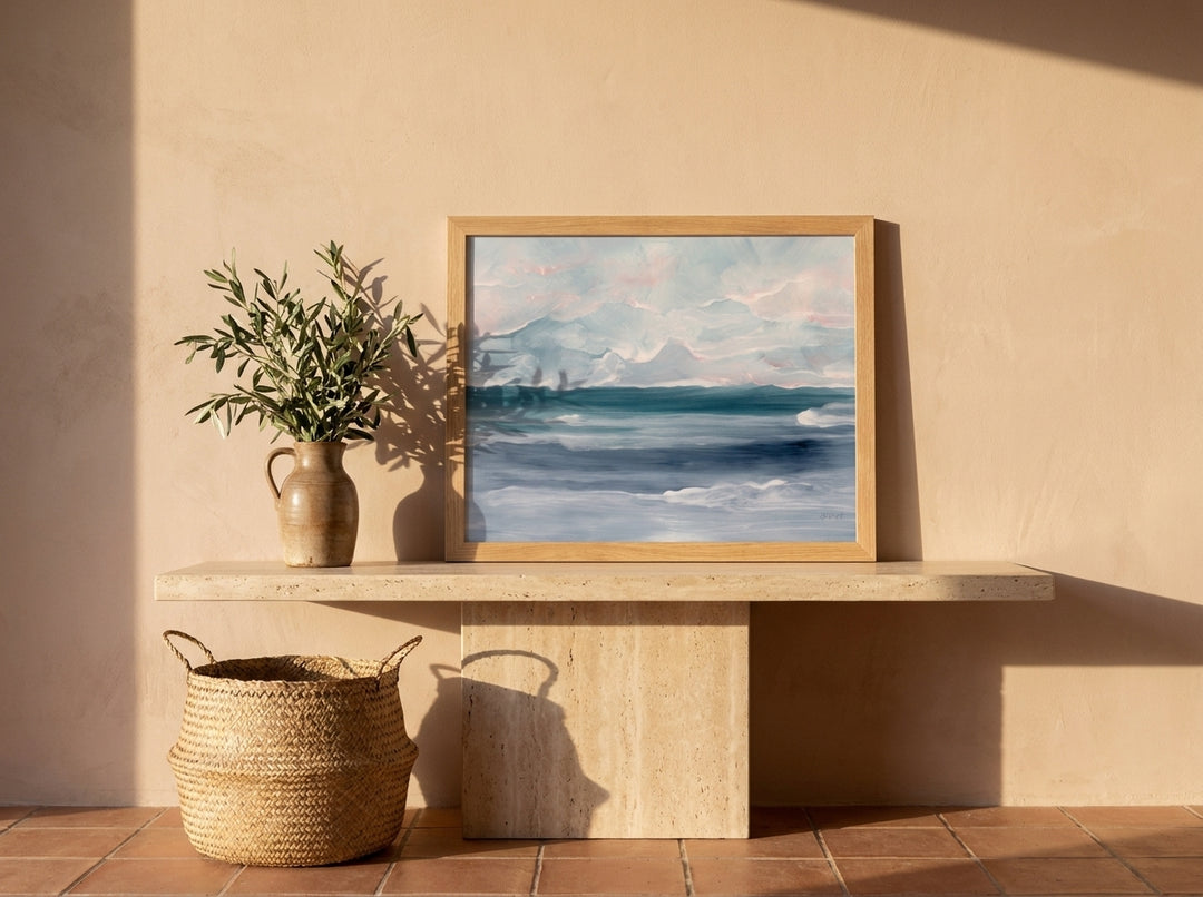 Modern wall art print standing on a console in a Mediterranean home office