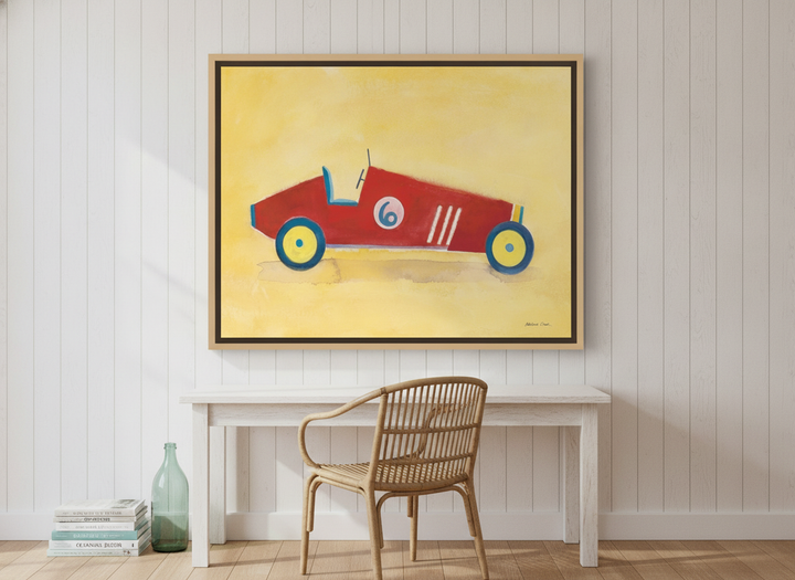 Oversized statement canvas wall art with a natural timber surround styled on the wall in a coastal home office