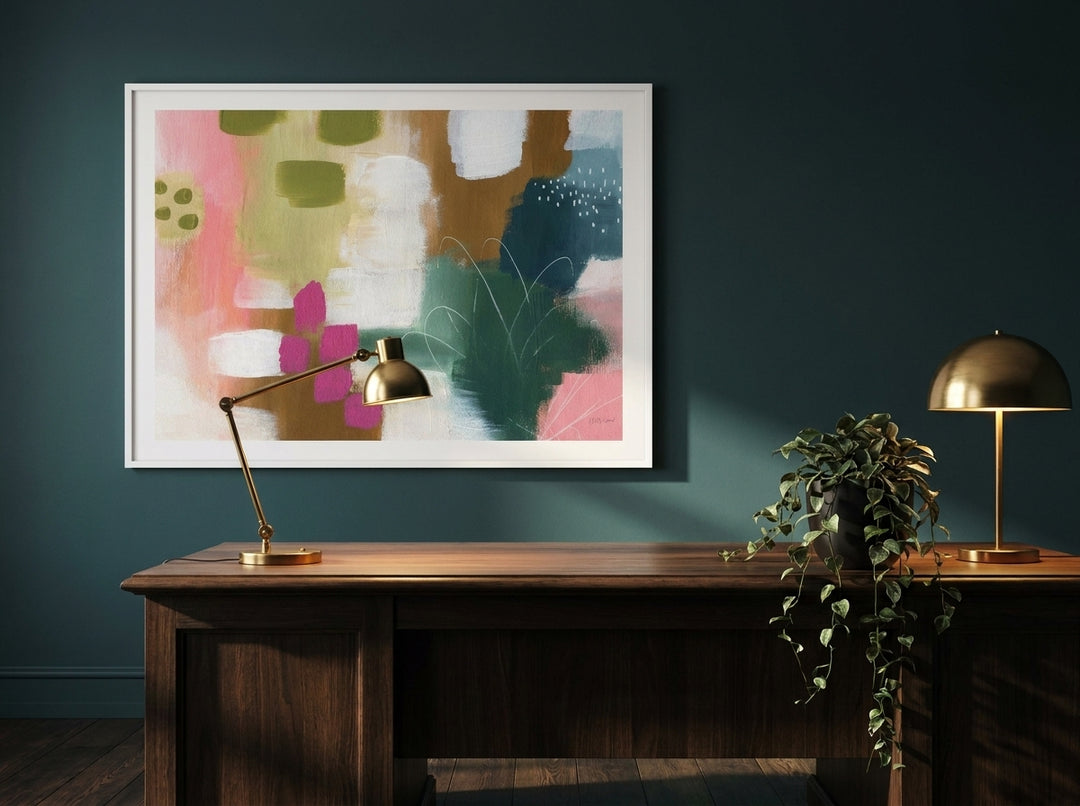 Modern wall art print styled on the wall in a moody home office