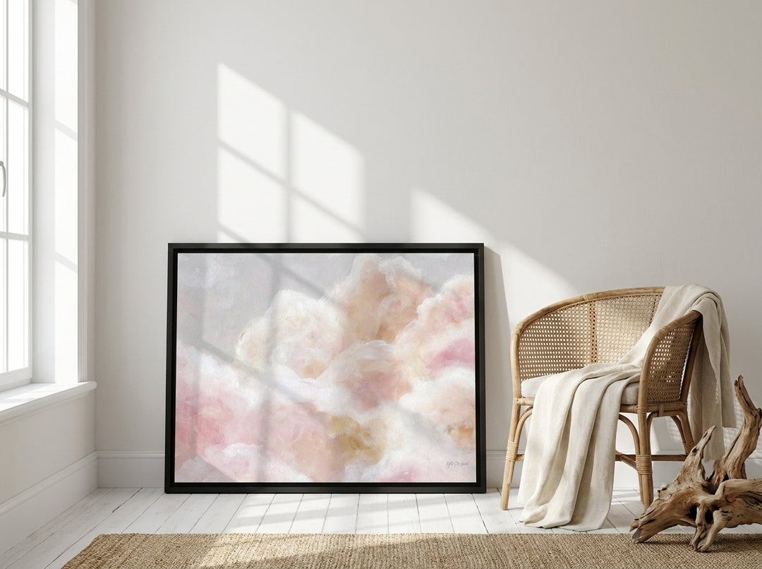 Canvas wall art with a black surround leaning against the wall in a coastal bathroom