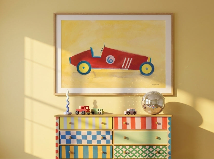 Modern wall art print styled on the wall in a colourful eclectic nursery