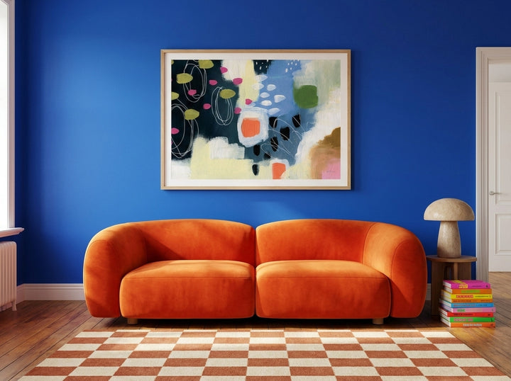 Modern wall art print styled on the wall in a colourful eclectic living room