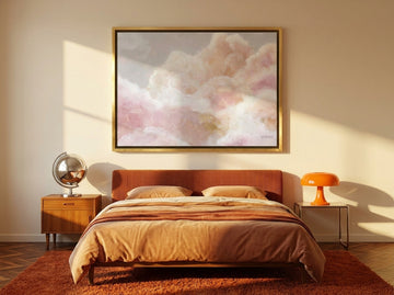 Canvas wall art with a gold leaf surround styled on the wall in a retro 70s bedroom