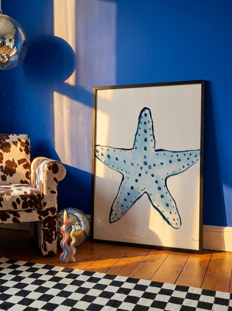 Modern wall art print leaning against the wall in a colourful eclectic kitchen