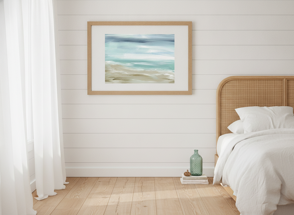 Modern wall art print styled on the wall in a coastal bedroom