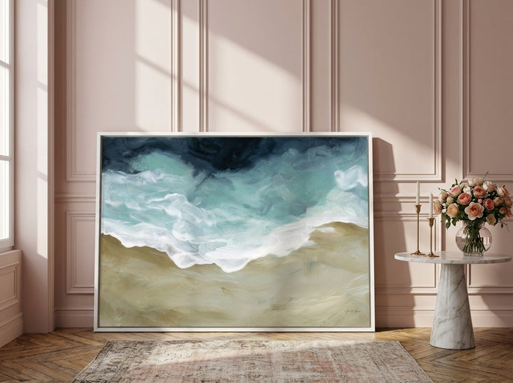 Canvas wall art with a white surround leaning against the wall in a Parisian bathroom